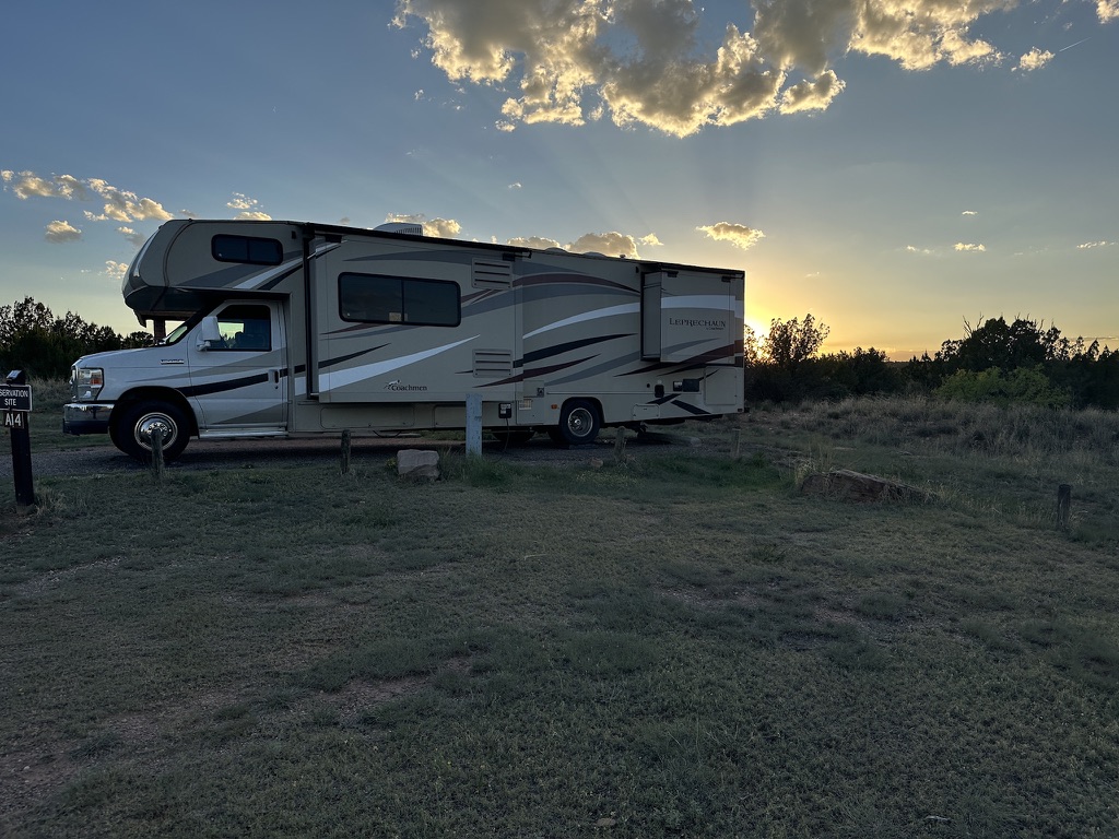 The actual Leprechaun parked with its slideouts open at sunset